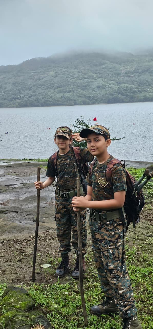 Young trekker overlooking a lake